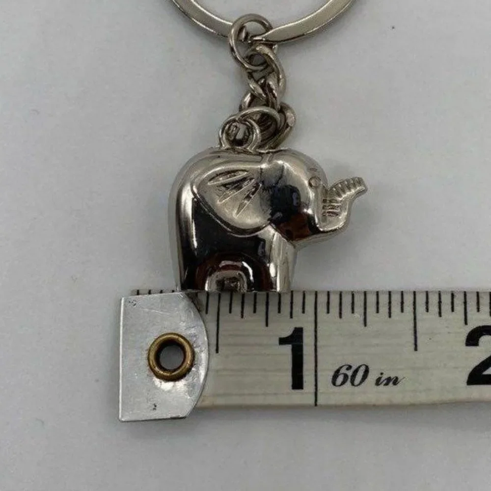 Metallic Elephant Keychain With Silver Tone Finish & Functional Compact Design‎